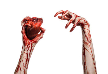 terrible bloody hand hold torn bleeding human heart isolated