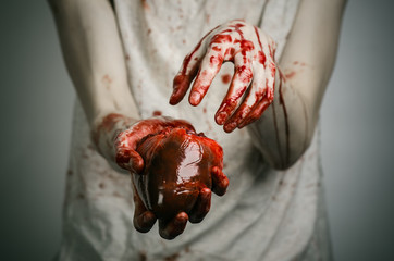 crazy killer keeps bloody hands torn bloody human heart