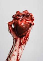 terrible bloody hand hold torn bleeding human heart isolated - 83552136