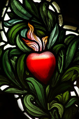 A red heart in stained glass