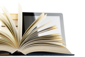 Composition with books and tablet computer isolated on white