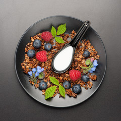 Homemade granola with berries . Top view
