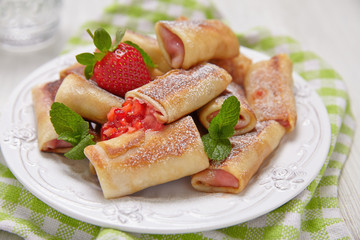 Fresh Strawberry French Crepes with Mint for Breakfast
