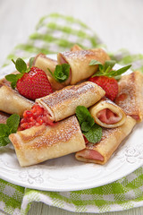 Fresh Strawberry French Crepes with Mint for Breakfast