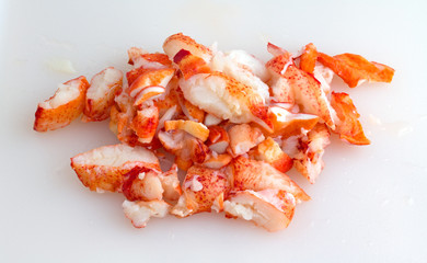 Chunks of lobster meat on cutting board