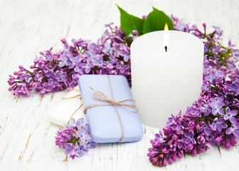 Fototapeta na wymiar Natural soap and lilac flowers
