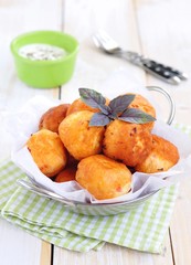 Snack doughnuts on a wooden table
