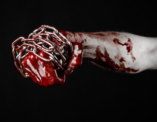 bloody hand holding chain, bloody chain, halloween theme, black