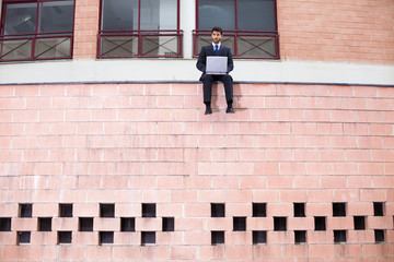 Businessman working with his laptop