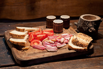 Bacon, tomato, bread and vodka