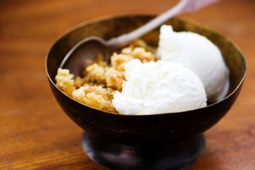 Crumble  from a rhubarb with ice cream.