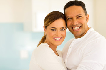 mid age couple hugging