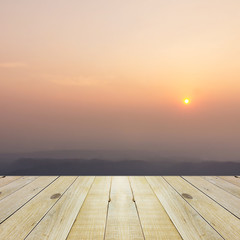 Fototapeta na wymiar Wood terrace and beautiful sunset