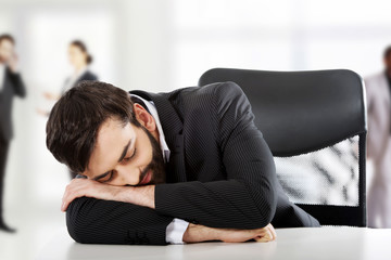 Fototapeta premium Tired handsome businessman.
