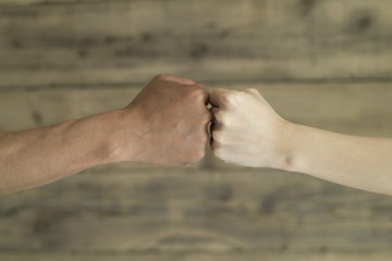Men and women are combined fist