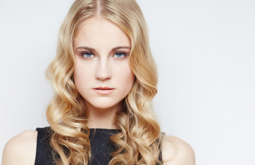 Naklejka premium Blond female in black dress