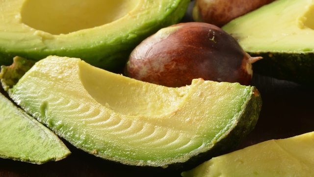 dolly out shot on sliced avocados
