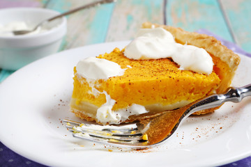 Tart with a pumpkin on plate