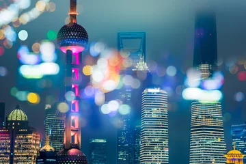 Cercles muraux Shanghai Lumières floues de la ville et immeubles de bureaux