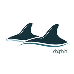 Fototapeta premium Dolphins dorsal fins above the water