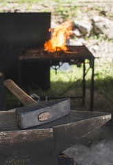 Vise and anvil in a forge shop