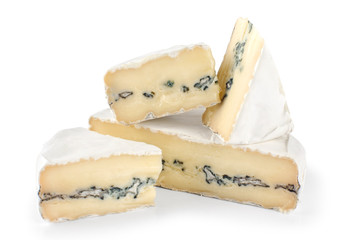 The cheese with a blue and a white mold isolated on white backgr