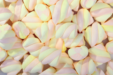 Fototapeta na wymiar background or texture of colorful mini marshmallows