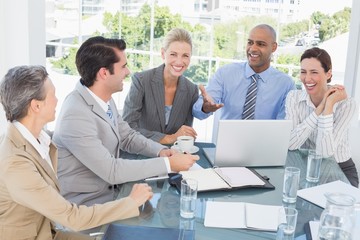 Happy business team having a meeting