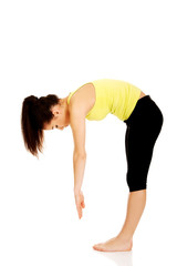 Fototapeta premium Fitness woman doing stretching exercise.