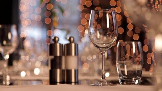 Restaurant Table Set for Many Persons