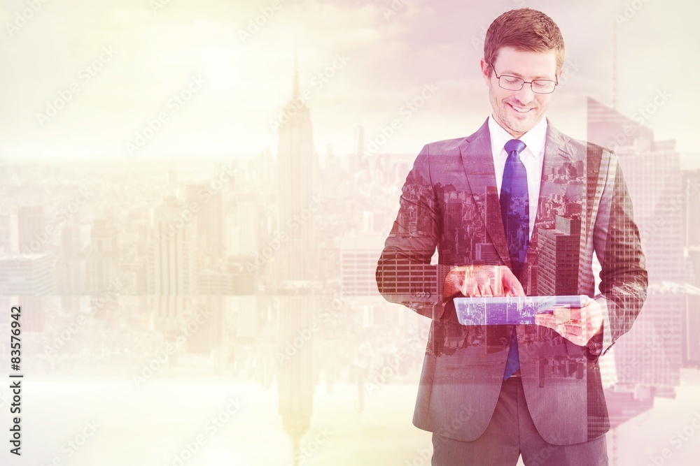 Aufkleber composite image of businessman using his tablet pc