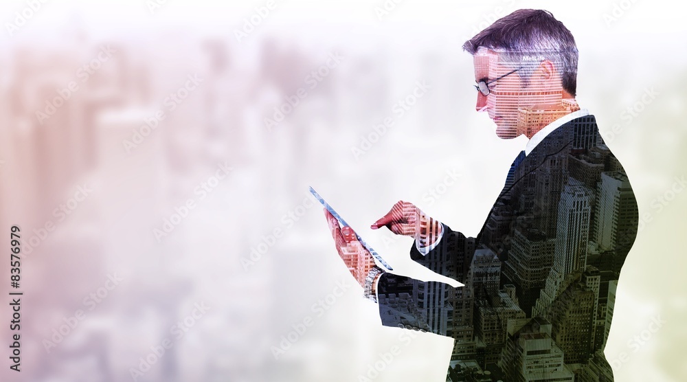 Poster composite image of mid section of a businessman touching tablet