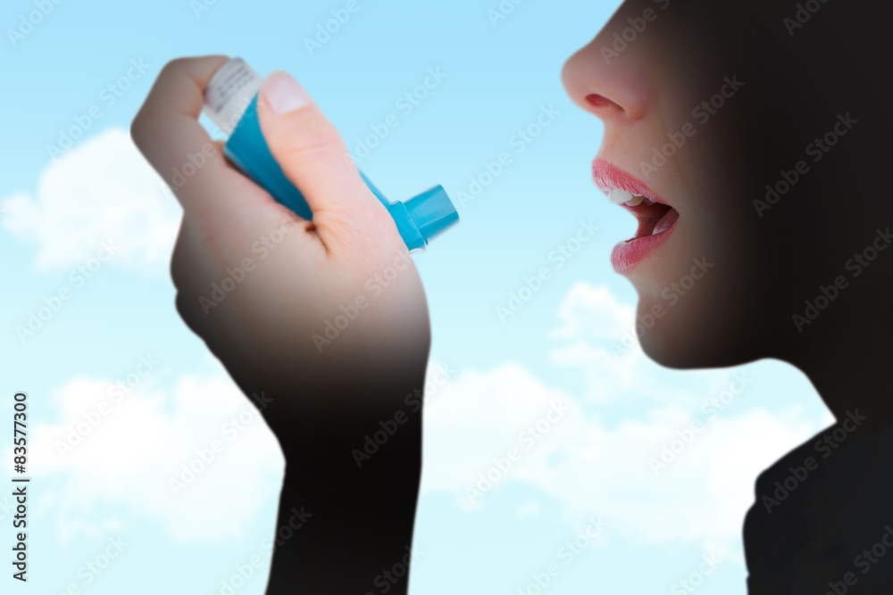 Poster Composite image of close up of a woman using an asthma inhaler