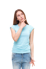 Fototapeta premium Beautiful thoughtful woman looking up - isolated on white.