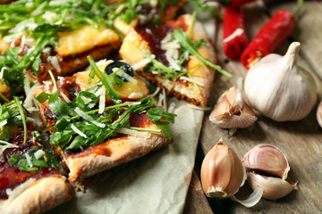 Tasty pizza with vegetables on table close up