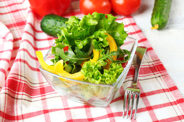 fresh vegetable salad in bowl on table close up