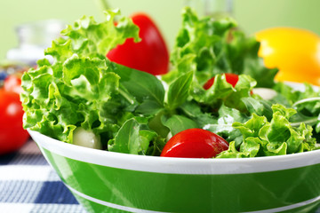 fresh vegetable salad in bowl on table close up