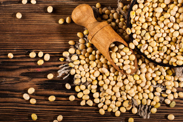 Soybeans on a wooden background. rustic style