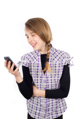 Smiling Girl Reading Funny Message on Her Mobile Phone