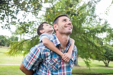 Father and son having fun in the park