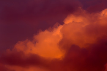 Lush clouds in fiery red tones