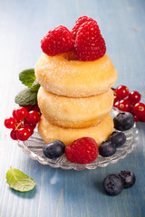 Morning breakfast with mini donuts and berries