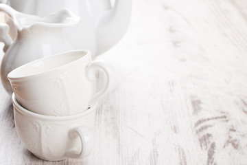 Obraz na płótnie Canvas White crockery for tea 