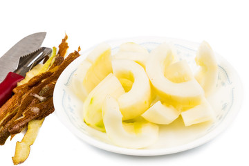Old Chinese yellow cucumber with skin peeled and portioned
