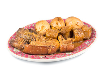 Chinese stewed pork, mushrooms, sea cucumber, and eggs dish