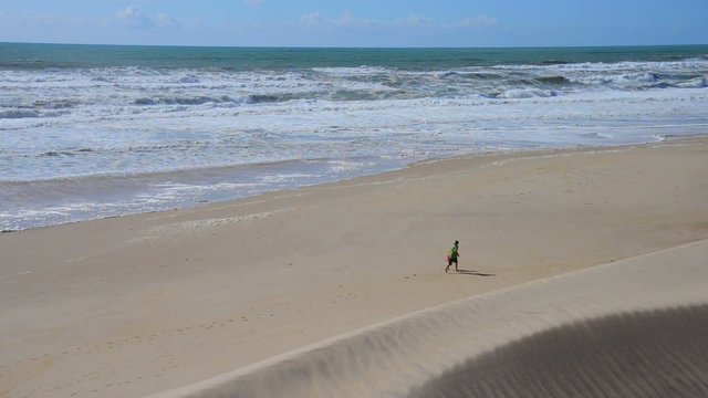 Sea, Sand and Dunes-People playing and walking on the beach