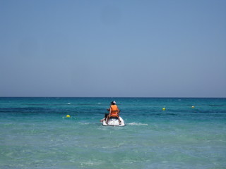 2 people on jet skis
