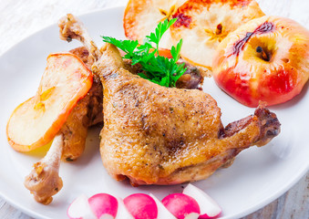 Roasted duck leg with baked apples