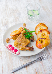 Roasted duck leg with baked apples