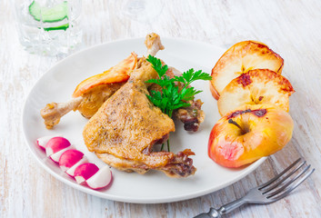 Roasted duck leg with baked apples